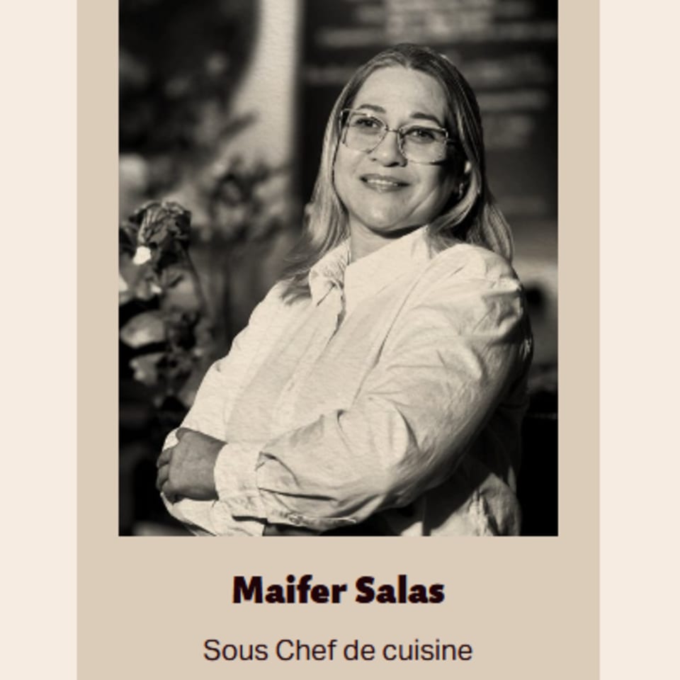 Black and white portrait of Maifer Salas, Sous Chef de cuisine at Bolivar Coffee.